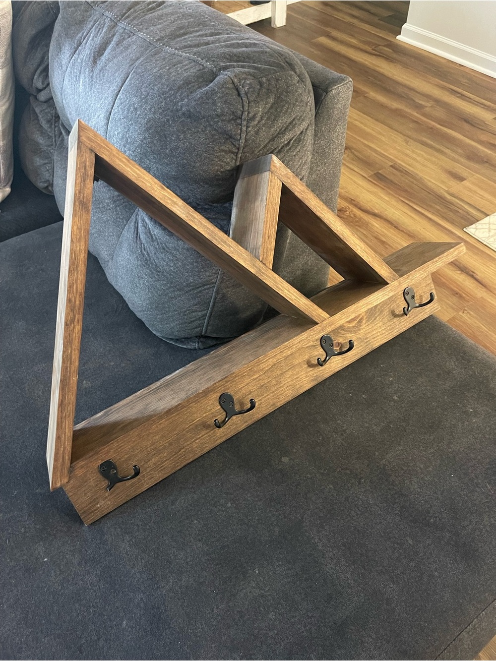 Rustic Wooden Wall Shelf with 4 Black Hooks - Brown